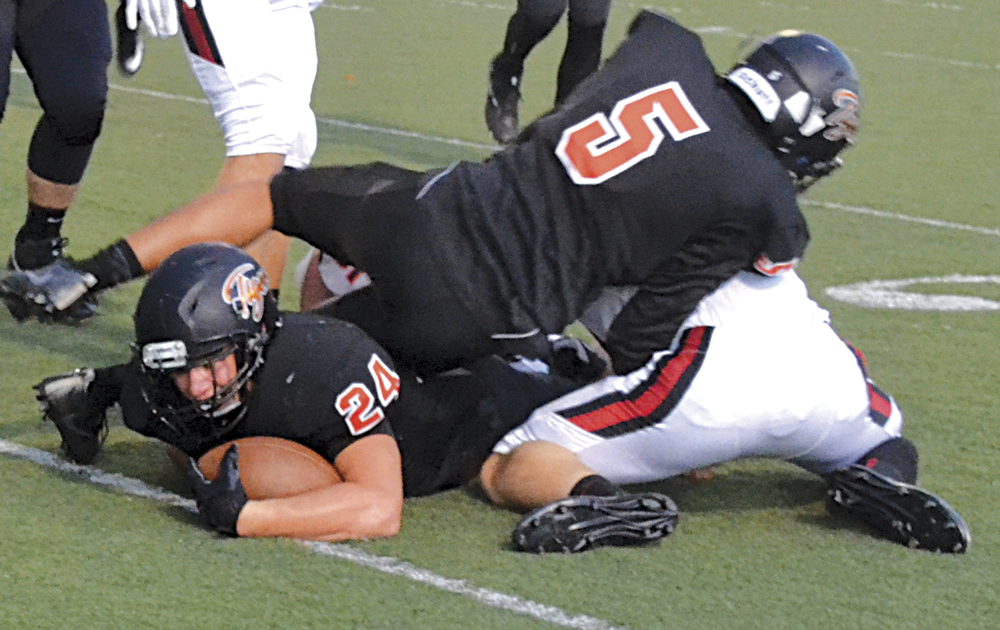 Marietta Tigers hang in there with New Philly, but fall 4414 News